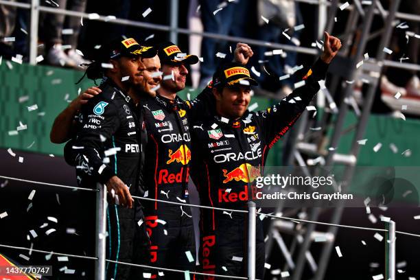 Race winner Max Verstappen of the Netherlands and Oracle Red Bull Racing, Second placed Lewis Hamilton of Great Britain and Mercedes, Third placed...