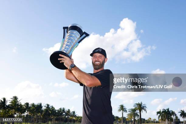 Team Captain Dustin Johnson of 4 Aces GC celebrates with the individual champions trophy after winning during the team championship stroke-play round...