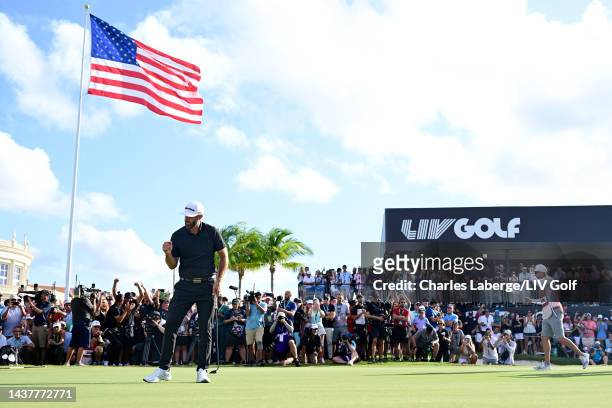 Team Captain Dustin Johnson of 4 Aces GC celebrates making his putt on the 18th green to win during the team championship stroke-play round of the...