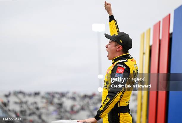 Christopher Bell, driver of the DeWalt Toyota, celebrates in victory lane after winning the NASCAR Cup Series Xfinity 500 at Martinsville Speedway on...