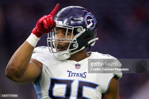 DeMarcus Walker of the Tennessee Titans celebrates a sack during the fourth quarter against the Houston Texans at NRG Stadium on October 30, 2022 in...