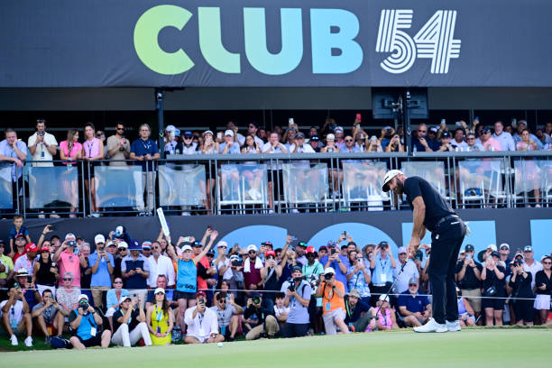 Team Captain Dustin Johnson of 4 Aces GC putts on the 18th green during the team championship stroke-play round of the LIV Golf Invitational - Miami...