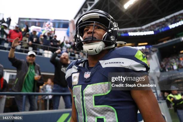 Tyler Lockett of the Seattle Seahawks celebrates a touchdown against the New York Giants during the fourth quarter at Lumen Field on October 30, 2022...