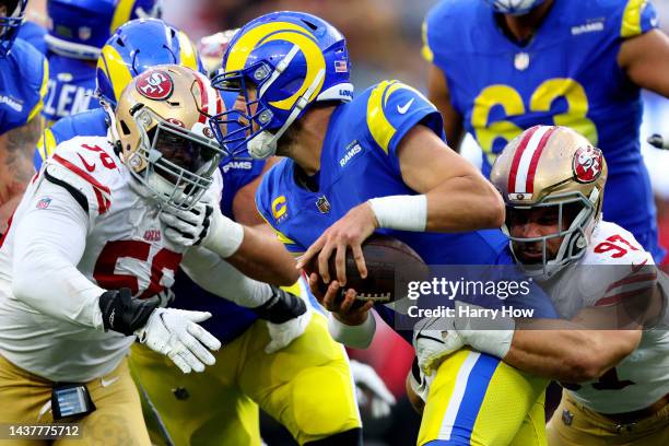 Matthew Stafford of the Los Angeles Rams is sacked by Nick Bosa of the San Francisco 49ers during the fourth quarter at SoFi Stadium on October 30,...