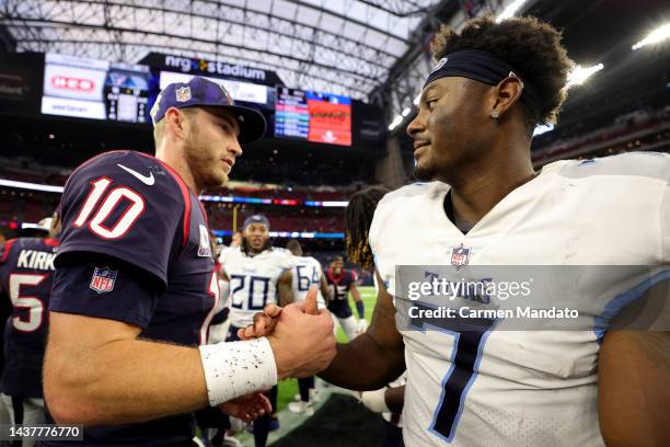 Malik Willis of the Tennessee Titans and Davis Mills of the Houston Texans shake hands after a game at NRG Stadium on October 30, 2022 in Houston,...