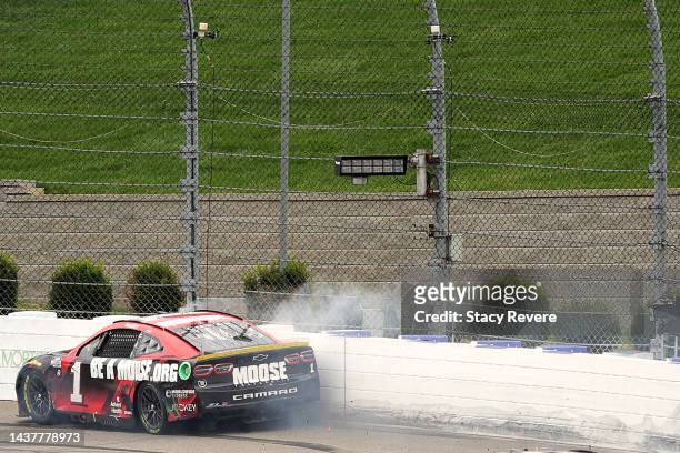 Ross Chastain, driver of the Moose Fraternity Chevrolet, rides the wall on the final lap of the NASCAR Cup Series Xfinity 500 at Martinsville...
