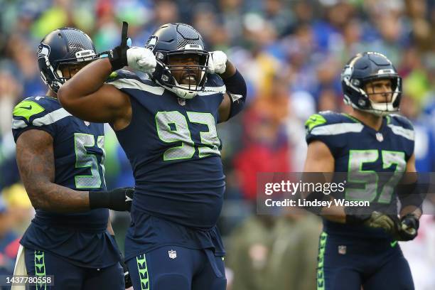 Shelby Harris of the Seattle Seahawks celebrates a stop against the New York Giants during the fourth quarter at Lumen Field on October 30, 2022 in...