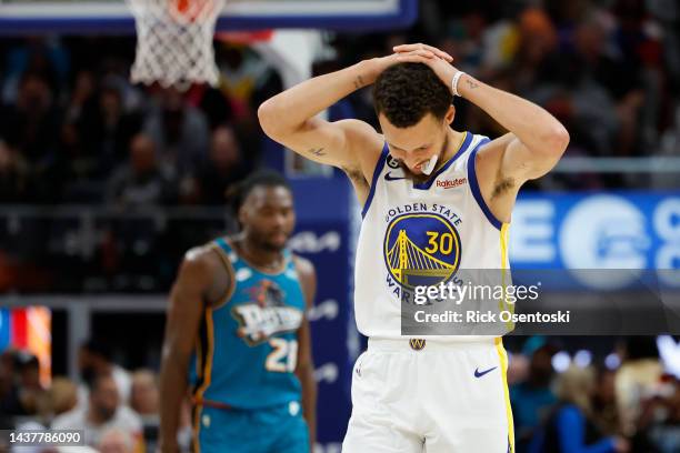 Stephen Curry of the Golden State Warriors reacts during the second half of the game against the Detroit Pistons at Little Caesars Arena on October...