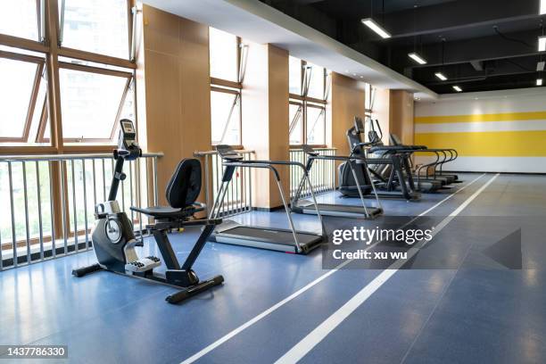 gym equipment - exercise machine stock pictures, royalty-free photos & images