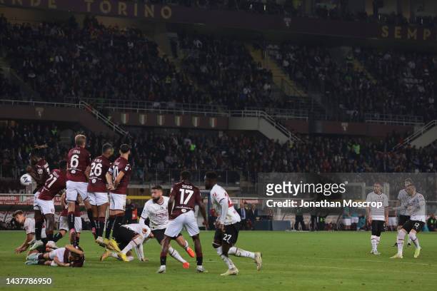 Ante Rebic of AC Milan fires a free kick goalwards that appears to pass close to the arm of Yann Karamoh of Torino FC following which AC Milan...
