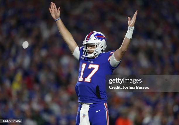 Josh Allen of the Buffalo Bills signals for a touchdown during the first quarter against the Green Bay Packers at Highmark Stadium on October 30,...