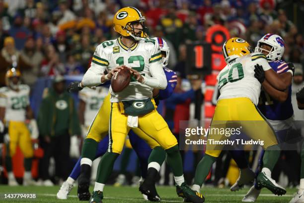 Aaron Rodgers of the Green Bay Packers looks to pass during the second quarter against the Buffalo Bills at Highmark Stadium on October 30, 2022 in...