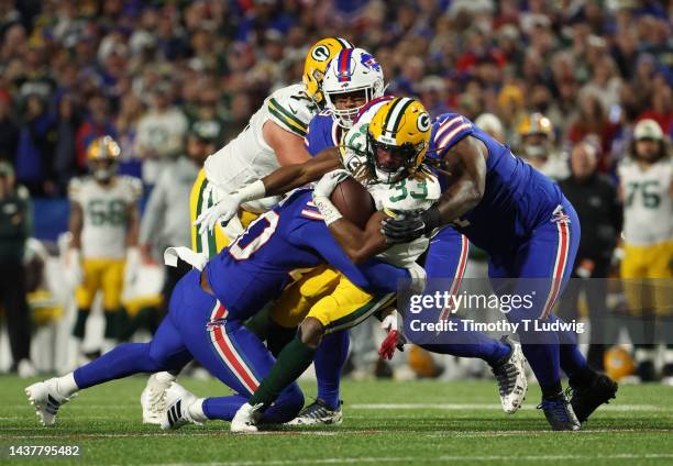 Aaron Jones of the Green Bay Packers rushes during the second quarter against the Buffalo Bills at Highmark Stadium on October 30, 2022 in Orchard...