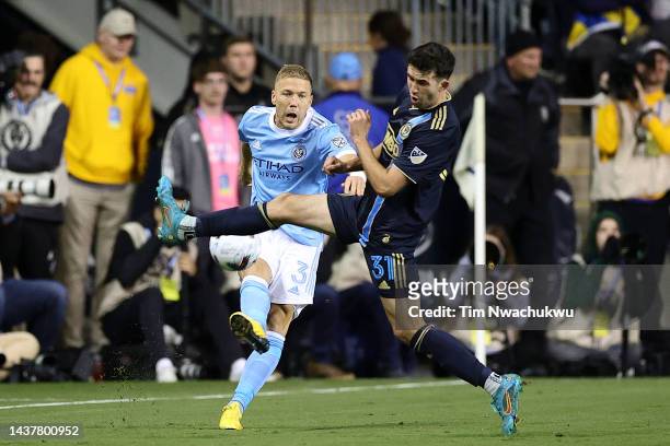 Anton Tinnerholm of New York City FC is blocked by Leon Flach of Philadelphia Union during the second half at Subaru Park on October 30, 2022 in...
