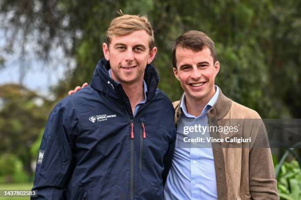 Trainer of Without A Fight, Ed Crisford poses with jockey William Buick during the Melbourne Cup Cavalcade and Press Conference on October 31, 2022...