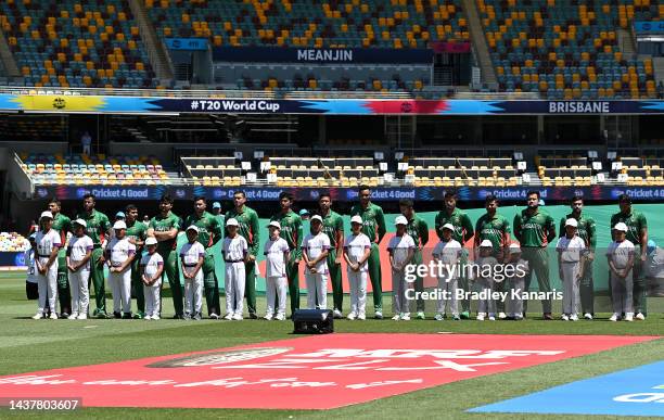 The Bangladesh players during the national anthem before the ICC Men's T20 World Cup match between Bangladesh and Zimbabwe at The Gabba on October...