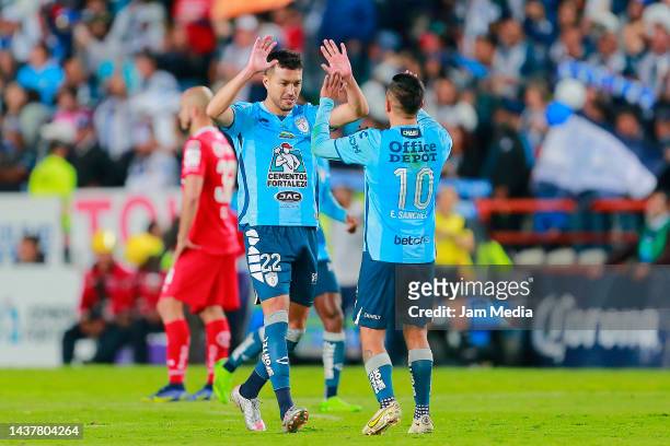 Gustavo Cabral of Pachuca celebrates with Erick Sanchez after scoring his team's third goal during the final second leg match between Pachuca and...