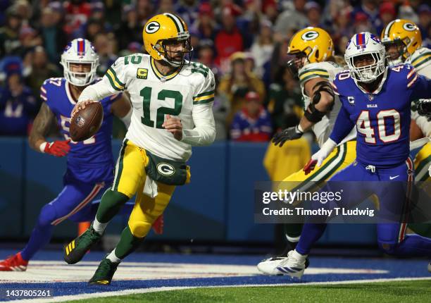 Aaron Rodgers of the Green Bay Packers looks to pass during the fourth quarter against the Buffalo Bills at Highmark Stadium on October 30, 2022 in...