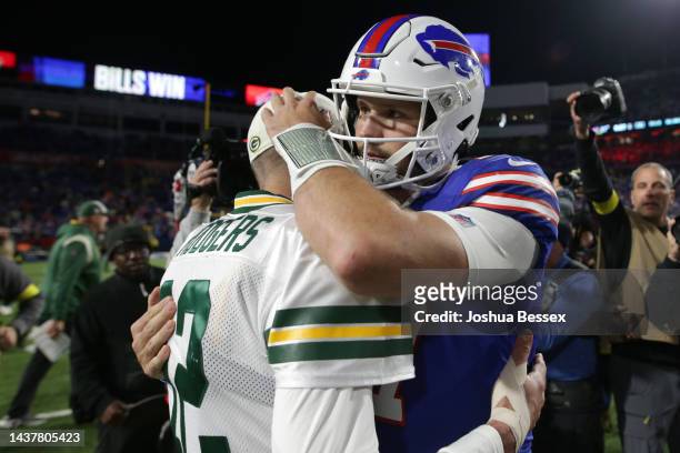 Josh Allen of the Buffalo Bills and Aaron Rodgers of the Green Bay Packers talk after their game at Highmark Stadium on October 30, 2022 in Orchard...