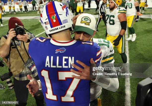 Josh Allen of the Buffalo Bills and Aaron Rodgers of the Green Bay Packers talk after their game at Highmark Stadium on October 30, 2022 in Orchard...