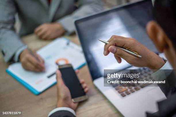 fund managers team consultation and discuss about analysis investment stock market by paperwork. - mentoring virtual stock pictures, royalty-free photos & images