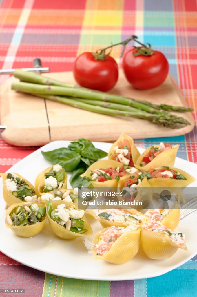 Trio of stuffed conchiglioni pasta