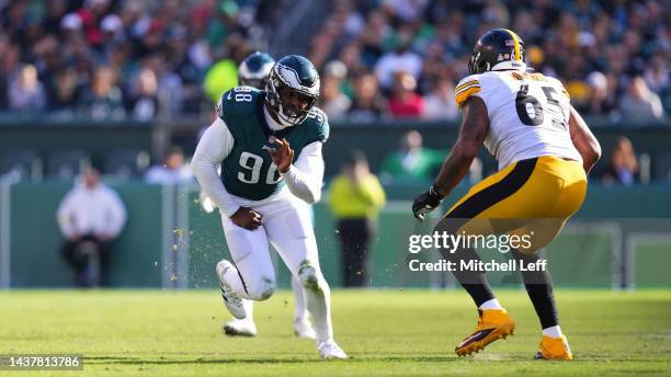 Robert Quinn of the Philadelphia Eagles rushes the passer against Dan Moore Jr. #65 of the Pittsburgh Steelers at Lincoln Financial Field on October...