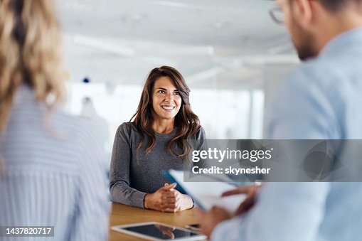 Happy female candidate on a job interview in the office. Happy female candidate on a job interview in the office.