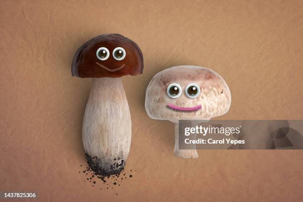 conceptual happy mushrooms with googly eyes - white mushroom photos et images de collection