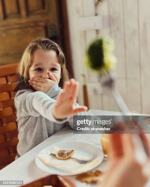 no, i' don't want to eat that! - angry parent mealtime stock pictures, royalty-free photos & images