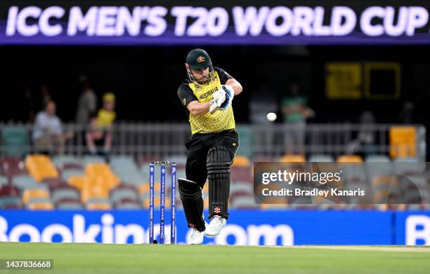 Aaron Finch of Australia plays a shot during the ICC Men's T20 World Cup match between Australia and Ireland at The Gabba on October 31, 2022 in...