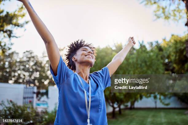 freedom, nature and woman nurse in a backyard garden with energy for fresh air in spring at her home. happy, smile and medical worker from mexico feeling free, calm and peace enjoying the outdoor sun - ground staff imagens e fotografias de stock