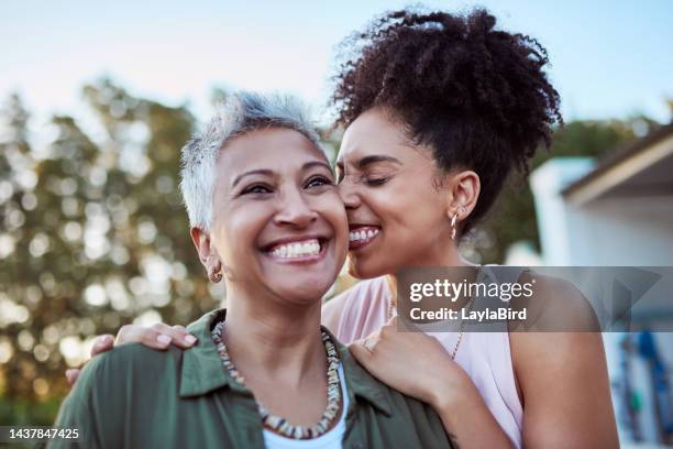 smile, mother and child in a garden for love, peace and care together on mothers day. happy, relax and calm woman with  affection for her senior mom at a home for people in retirement in a backyard - happy mother's day stockfoto's en -beelden