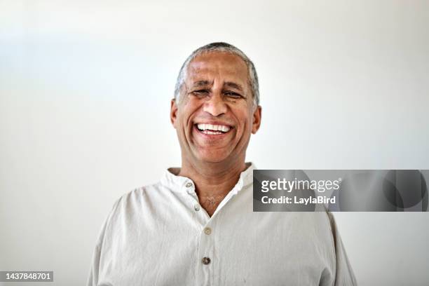 senior man, portrait smile and teeth in dental healthcare, retirement and wellness against a grey studio background. elderly retired toothy male smiling for oral, mouth or gum care treatment - portraits studio smile stockfoto's en -beelden