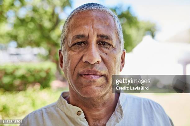 face portrait, serious and senior man in nature, outdoors or in park, thinking about retirement or memory. old, retired and elderly male from india sad, lost in thoughts or lonely facial expression. - blank expression imagens e fotografias de stock