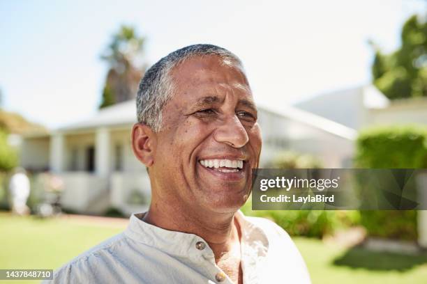 face, happy and retirement with a senior man in the garden of his home during summer with a smile. thinking, head and pensioner with an elderly male smiling outside in his backyard on a sunny day - close to stock pictures, royalty-free photos & images