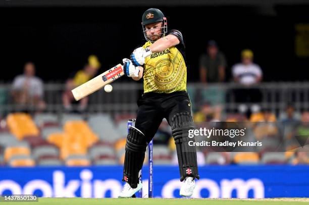 Aaron Finch of Australia plays a shot during the ICC Men's T20 World Cup match between Australia and Ireland at The Gabba on October 31, 2022 in...