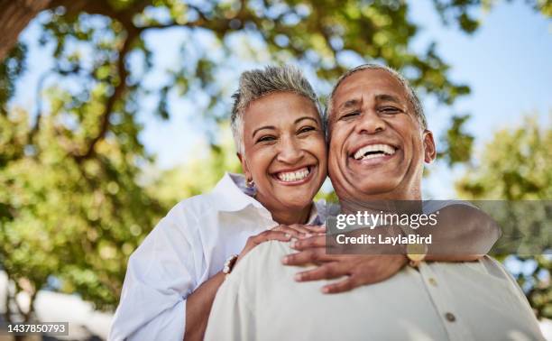 garden, hugging and portrait of senior couple enjoy retirement in nature. summer, love and retired man and woman in mexico embrace, smile and hug in outdoor park on sunny day bond, affection and joy - man love 個照片及圖片檔