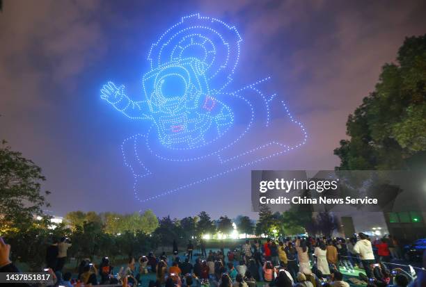 Total of 2,022 drones form an astronaut-shaped pattern during a light show to celebrate the 70th founding anniversary of Nanjing University of...