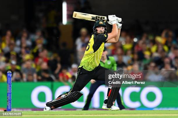 Tim David of Australia bats during the ICC Men's T20 World Cup match between Australia and Ireland at The Gabba on October 31, 2022 in Brisbane,...