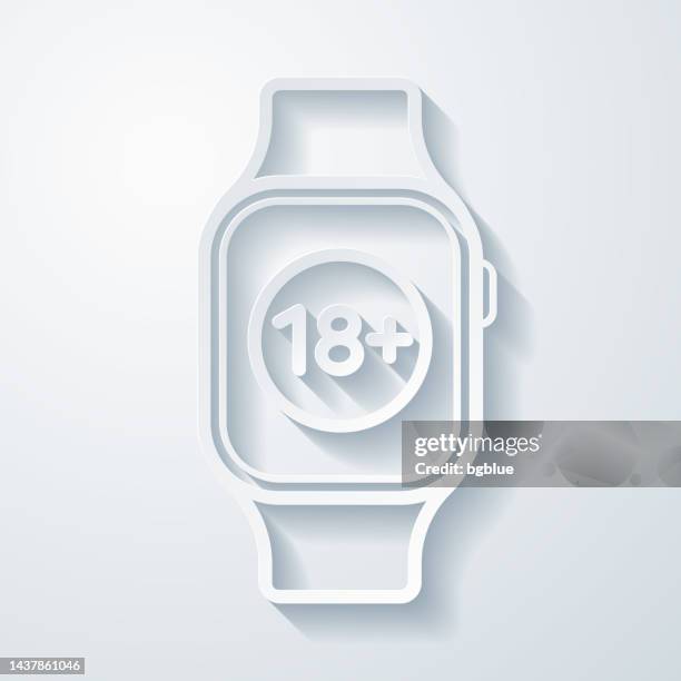 smartwatch with eighteen plus sign (18+). icon with paper cut effect on blank background - under attack stock illustrations