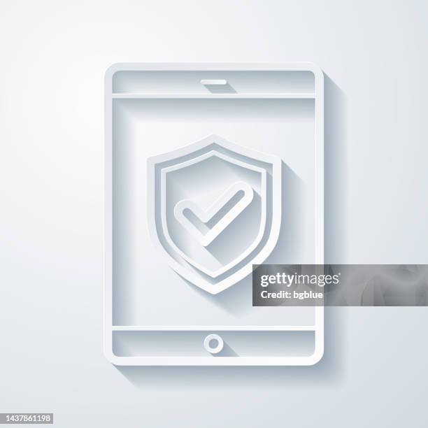 secure tablet pc. icon with paper cut effect on blank background - quality control approved stock illustrations