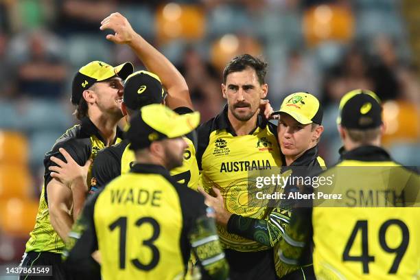 Mitchell Starc of Australia celebrates dismissing George Dockrell of Ireland during the ICC Men's T20 World Cup match between Australia and Ireland...