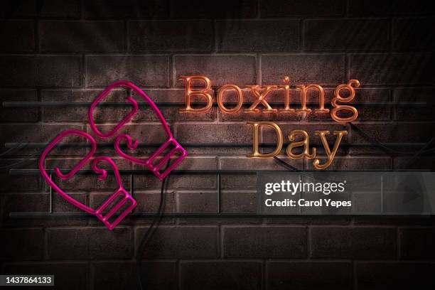 boxing day in neon lights style - boxing day stock pictures, royalty-free photos & images