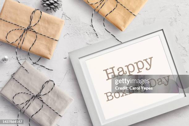 boxing day sale , wooden letters and gift box  on white rustic wooden background - boxing day stock pictures, royalty-free photos & images