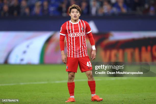 Ritsu Doan of SC Freiburg in action during the Bundesliga match between FC Schalke 04 and Sport-Club Freiburg at Veltins-Arena on October 30, 2022 in...