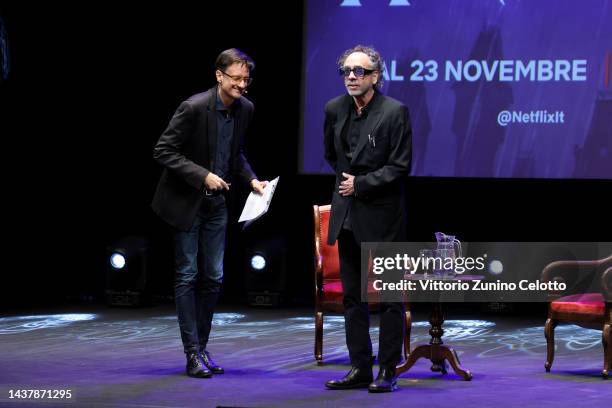 Director of Lucca Comics & Games Emanuele Vietina and Tim Burton attend the "Wednesday" Series press conference during the 56th Lucca Comics & Games...