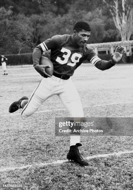 American football player Leroy Bolden running with the ball during a training session with the Michigan State Spartans, in East Lansing, Michigan,...