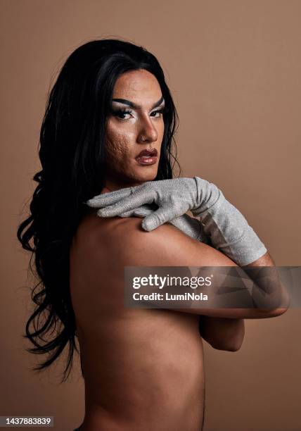 male model portrait with makeup for fashion, empowerment and pride with gloves in backdrop. lgbt, man and cosmetics show skin, body and beauty for gay, queer inclusion - beautiful gay men stock pictures, royalty-free photos & images