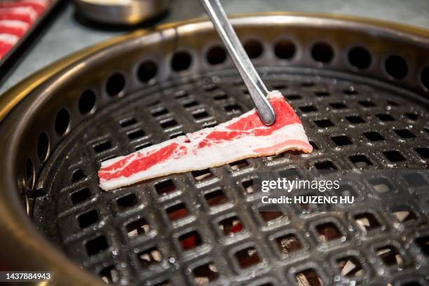 grilling beef. korean barbecue - barbecue pork stock pictures, royalty-free photos & images